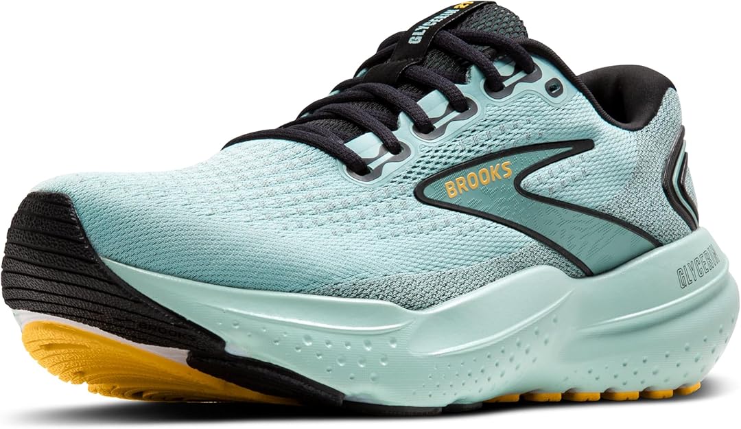 Una scarpa da corsa Brooks Glycerin 21 di colore azzurro con lacci neri, suola spessa e ammortizzata e dettagli gialli sulla suola.