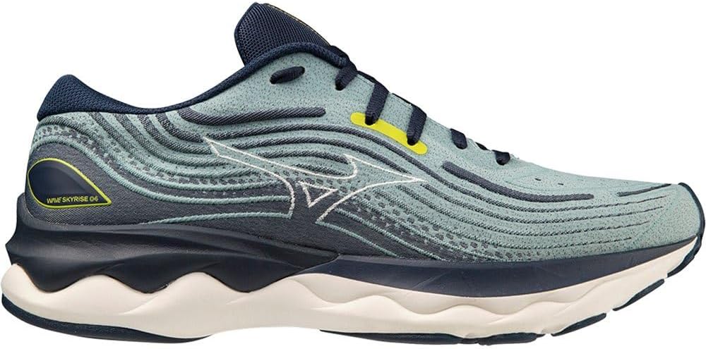 Vista laterale di una scarpa da corsa Wave Skyrise blu e grigia con motivi a onda, accenti gialli e suola bianca.