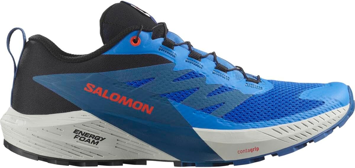 Scarpa da corsa Salomon Sense Ride blu e nera con suola bianca, caratterizzata dal marchio Salomon e dalle etichette Energy Foam e Contagrip sull'intersuola.